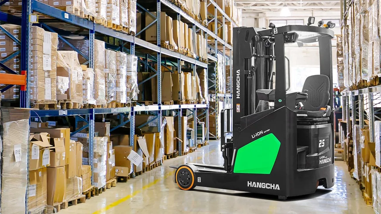 A Hangcha lithium ion electric reach truck in a warehouse aisle lined with pallet racking, with Hangcha branding on the side