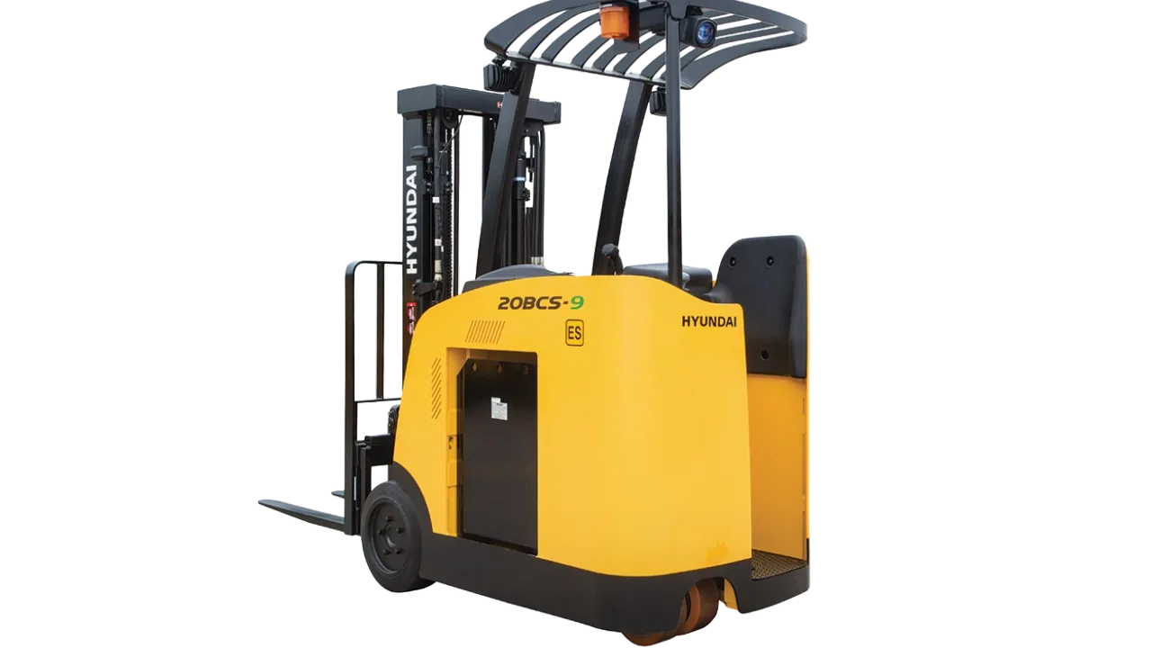 A yellow Hyundai electric counterbalance forklift truck shown against a black studio background, with Hyundai branding on the side
